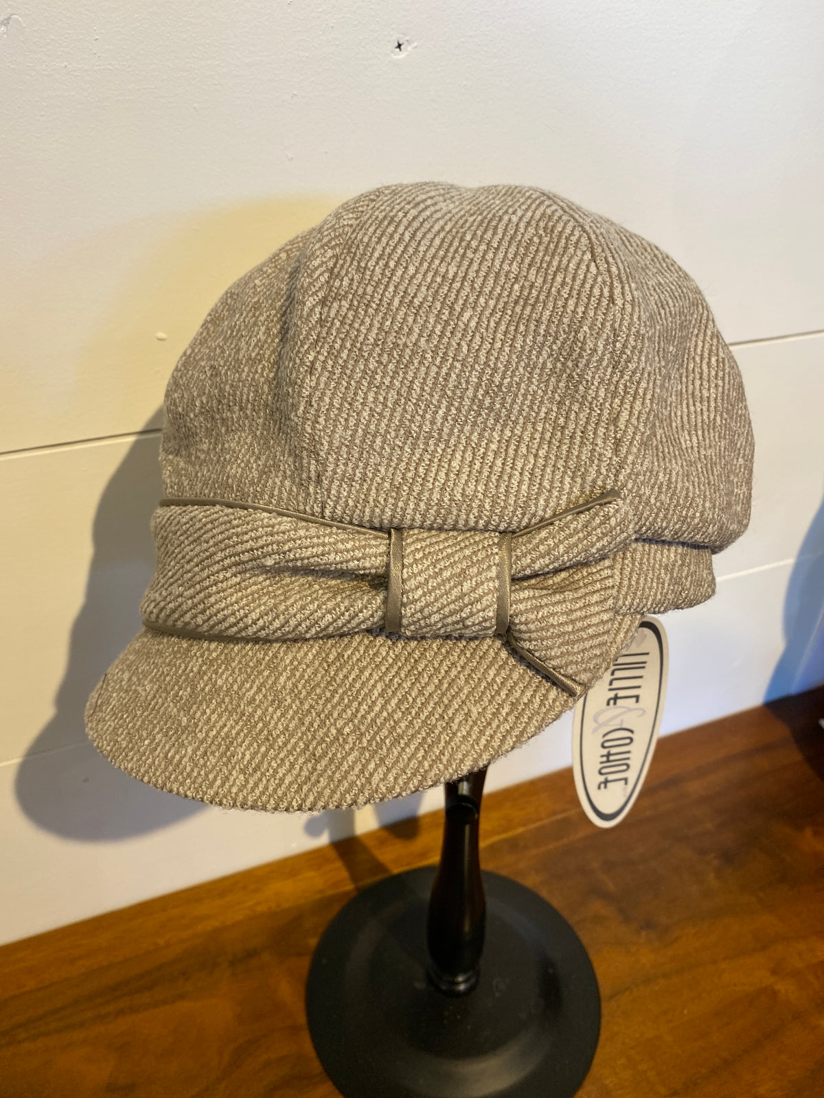 Lillie and Cohoe News Cap